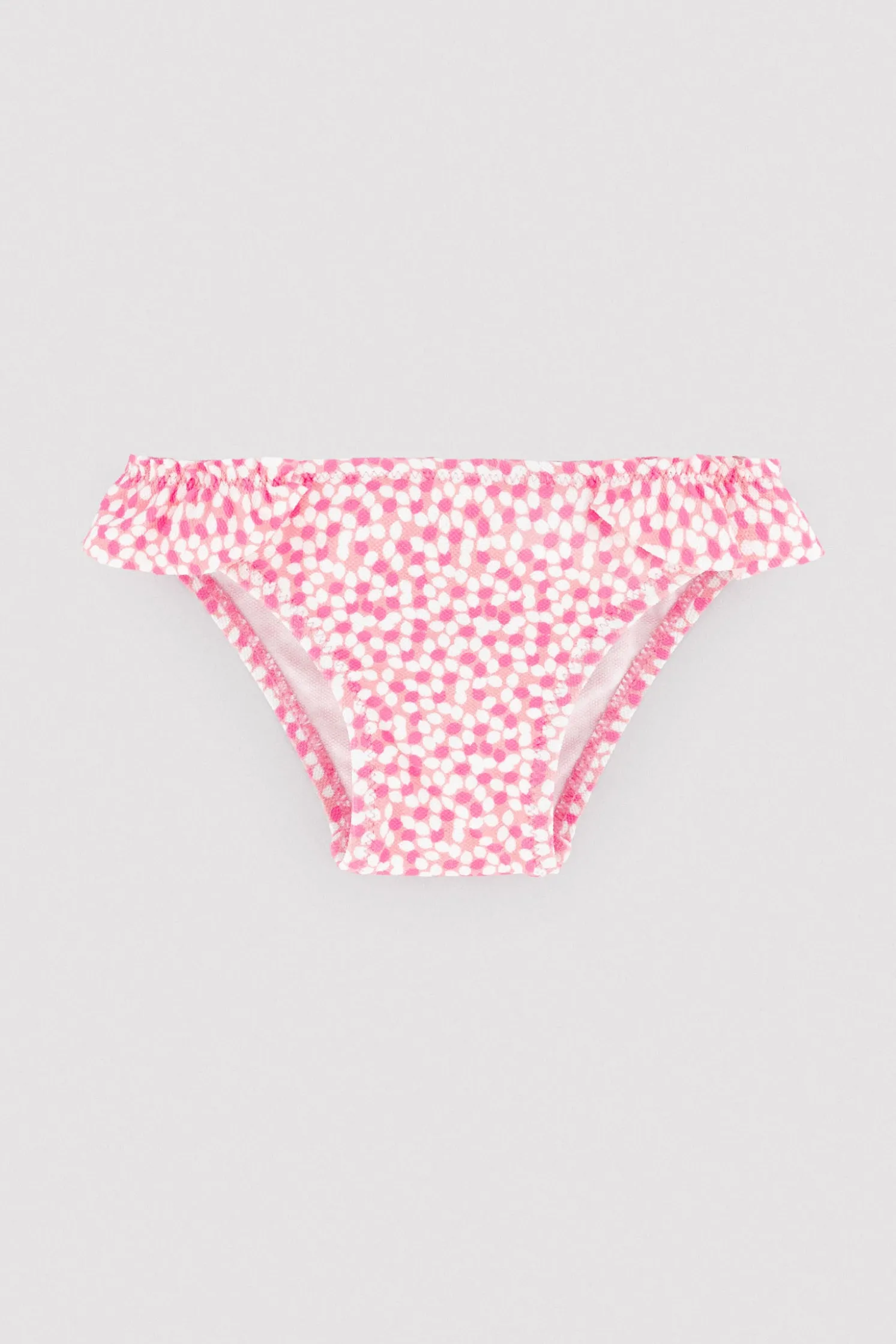 Bañador culetín bebé texturizado detalles volantes estampado rosa