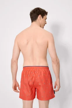 Bañador medio estampado pingüinos naranja
