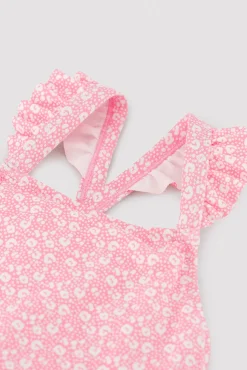 Bañador niña detalles volantes y tirantes cruzados estampado leopardo rosa