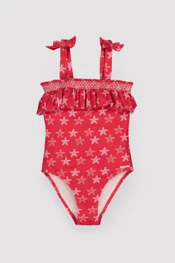Bañador niña detalle volante estampado estrellas marinas rojo
