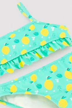 Bikini niña detalle volante estampado limones
