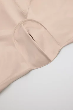 Body-up reductor con abertura acabados invisibles nude