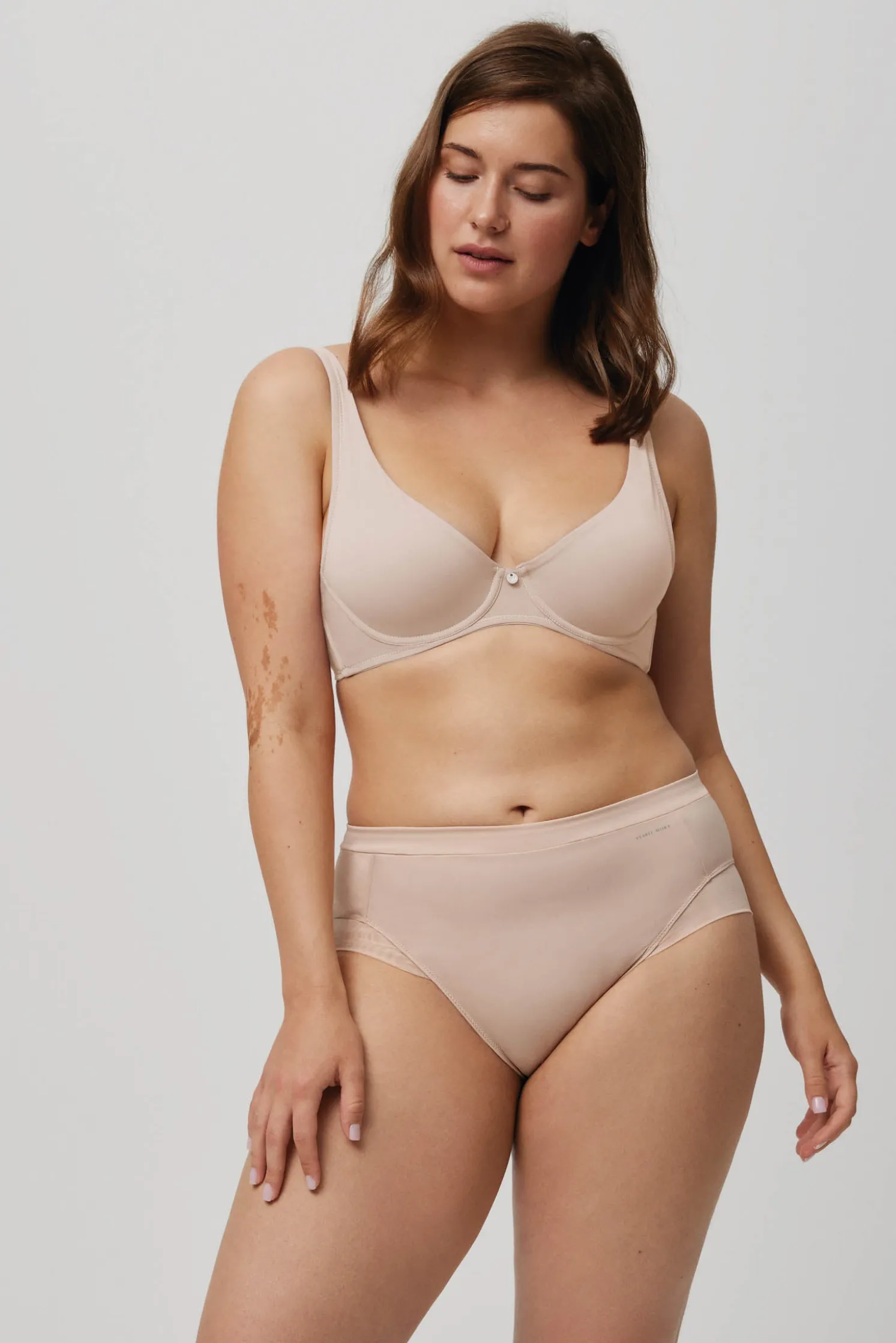 Braga alta con tul nude