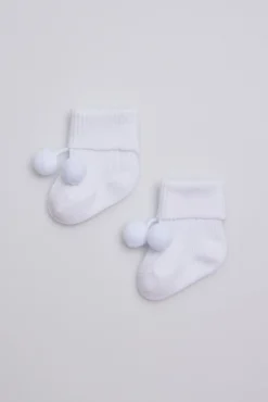 Calcetines canalé con borlas recién nacido blanco