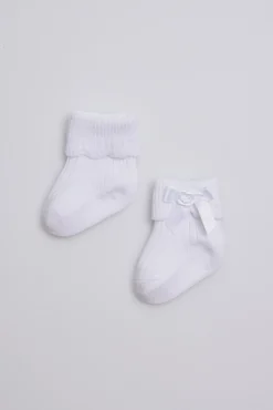 Calcetines canalé con lazo recién nacido blanco