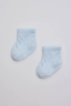 Calcetines perlé recién nacido celeste