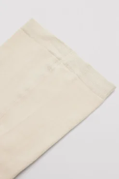 Leotardo clásico bebé beige
