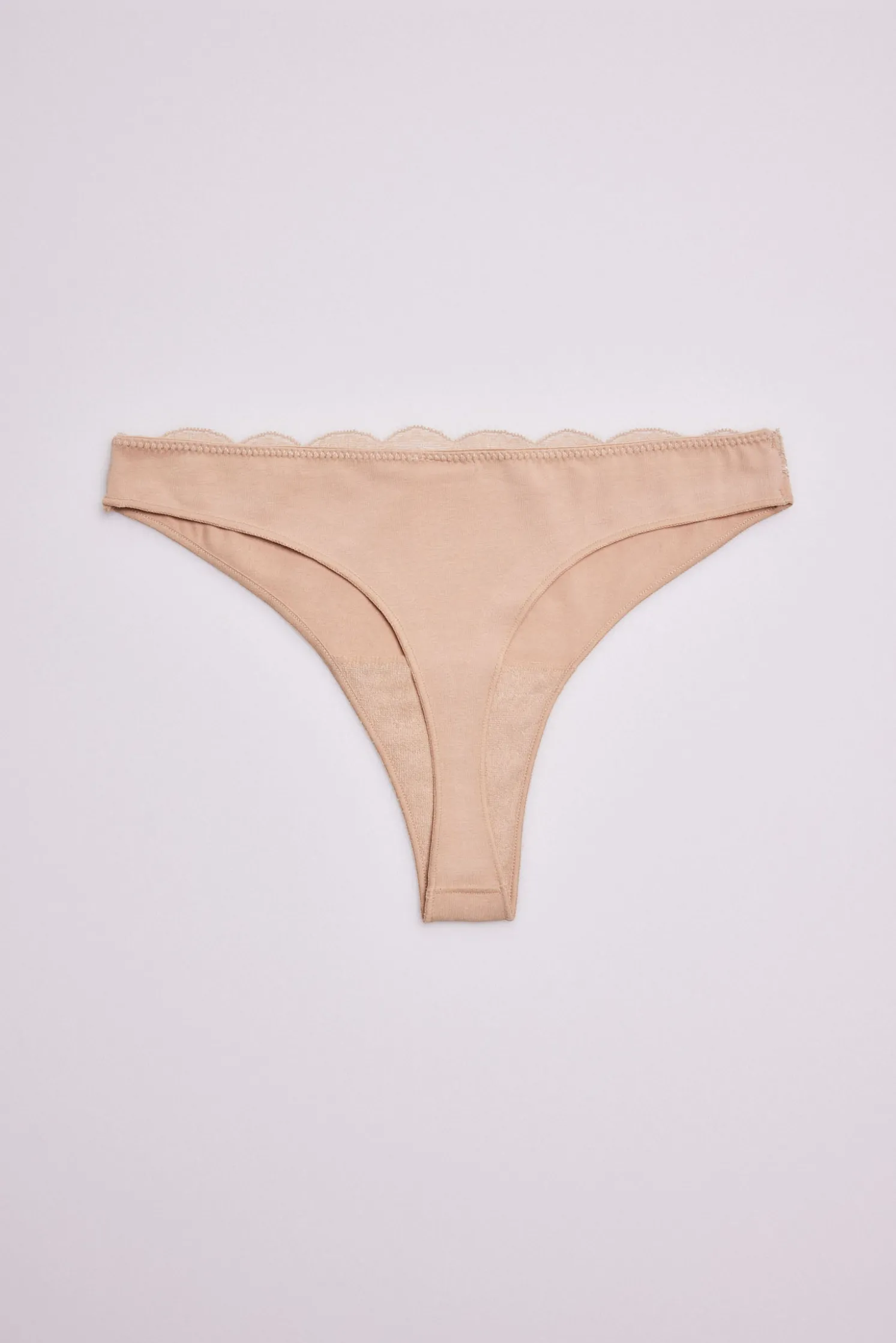 Tanga lencero nude